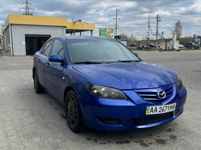 Синий Мазда 3, объемом двигателя 2 л и пробегом 211 тыс. км за 2200 $, фото 1 на Automoto.ua