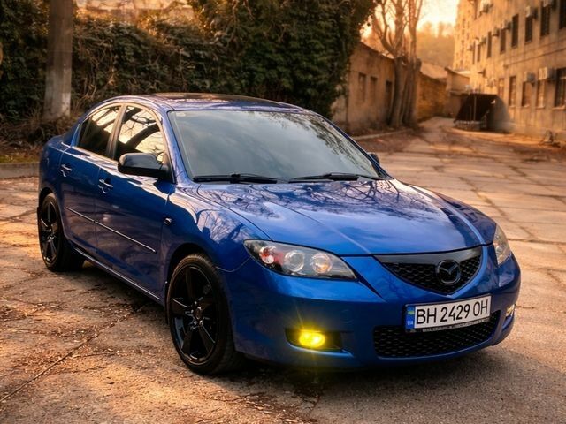 Синий Мазда 3, объемом двигателя 1.6 л и пробегом 180 тыс. км за 7400 $, фото 1 на Automoto.ua