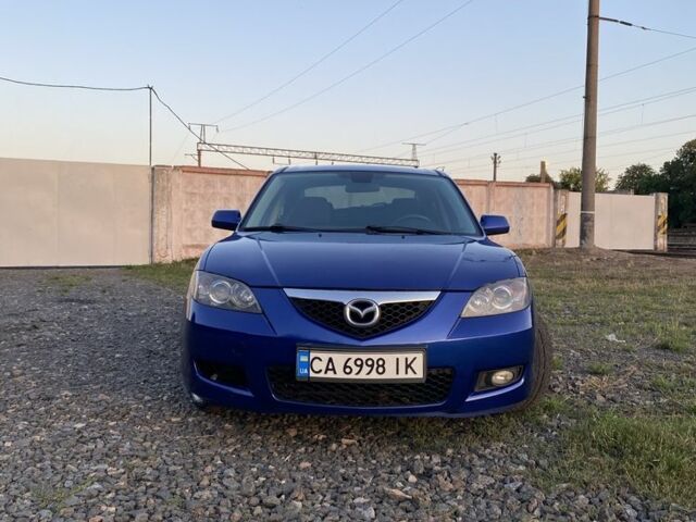 Синий Мазда 3, объемом двигателя 2 л и пробегом 313 тыс. км за 4500 $, фото 1 на Automoto.ua