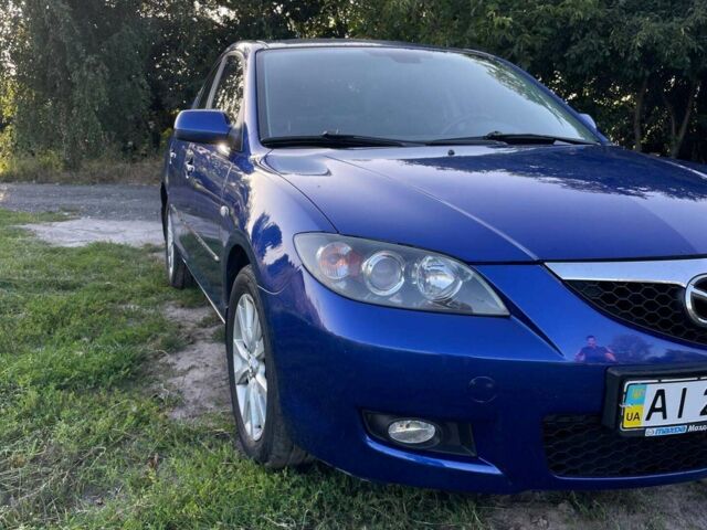 Синий Мазда 3, объемом двигателя 1.6 л и пробегом 203 тыс. км за 5500 $, фото 1 на Automoto.ua