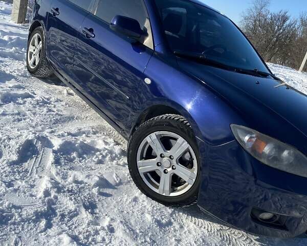 Синій Мазда 3, об'ємом двигуна 2 л та пробігом 240 тис. км за 5499 $, фото 1 на Automoto.ua