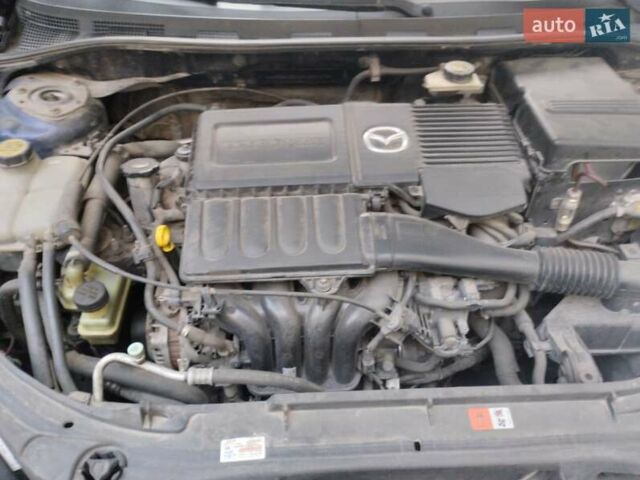 Синий Мазда 3, объемом двигателя 1.6 л и пробегом 160 тыс. км за 6000 $, фото 1 на Automoto.ua