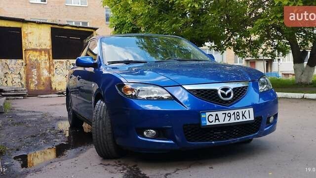 Синий Мазда 3, объемом двигателя 1.6 л и пробегом 170 тыс. км за 6500 $, фото 1 на Automoto.ua