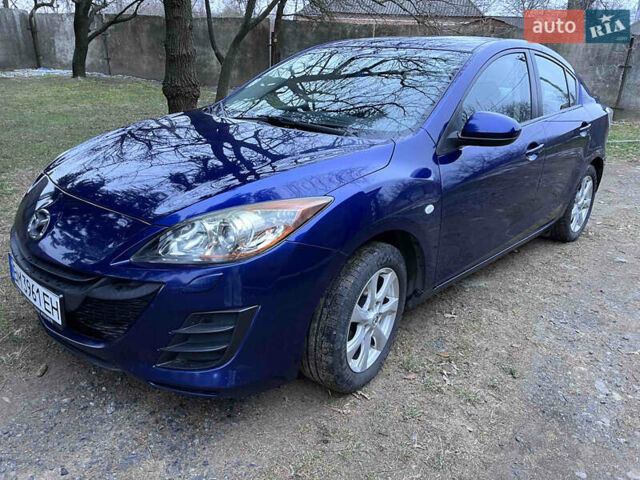 Синий Мазда 3, объемом двигателя 1.6 л и пробегом 171 тыс. км за 7550 $, фото 1 на Automoto.ua