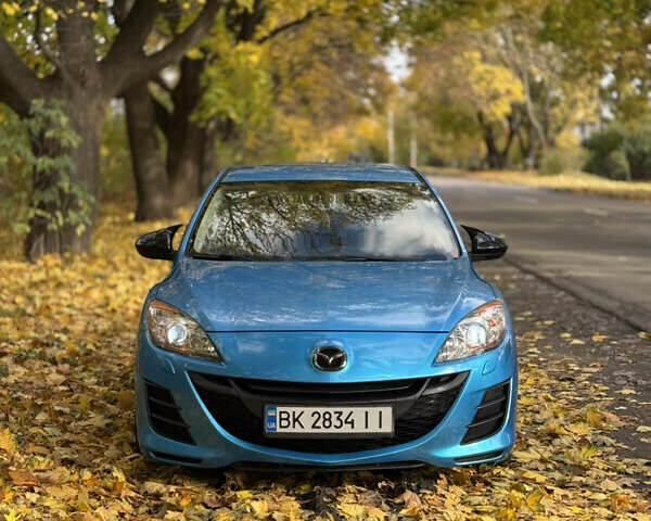 Синий Мазда 3, объемом двигателя 1.6 л и пробегом 206 тыс. км за 7500 $, фото 1 на Automoto.ua