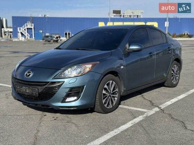 Синий Мазда 3, объемом двигателя 1.6 л и пробегом 170 тыс. км за 7300 $, фото 1 на Automoto.ua
