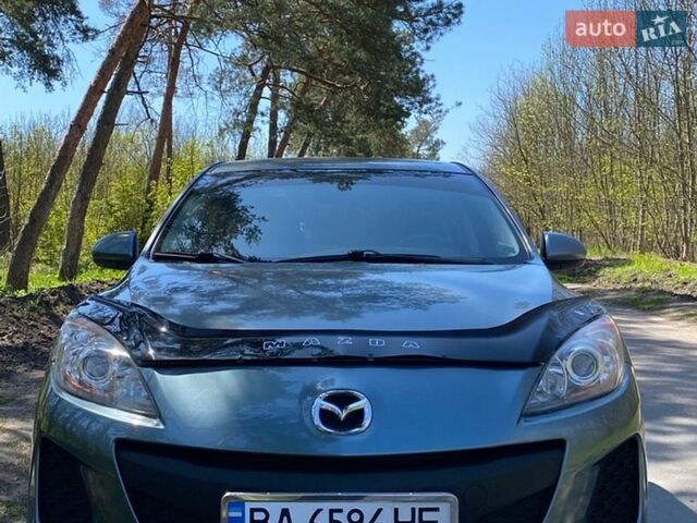 Синий Мазда 3, объемом двигателя 2 л и пробегом 165 тыс. км за 7500 $, фото 1 на Automoto.ua