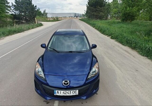 Синий Мазда 3, объемом двигателя 2 л и пробегом 238 тыс. км за 6599 $, фото 1 на Automoto.ua