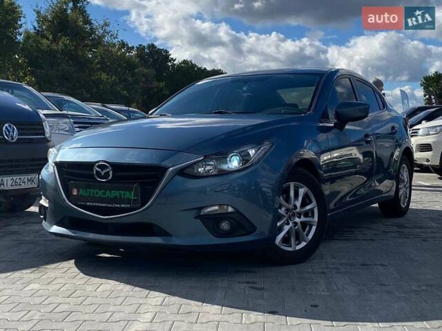 Синий Мазда 3, объемом двигателя 1.5 л и пробегом 222 тыс. км за 10990 $, фото 1 на Automoto.ua