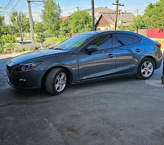Синий Мазда 3, объемом двигателя 2 л и пробегом 137 тыс. км за 9600 $, фото 1 на Automoto.ua