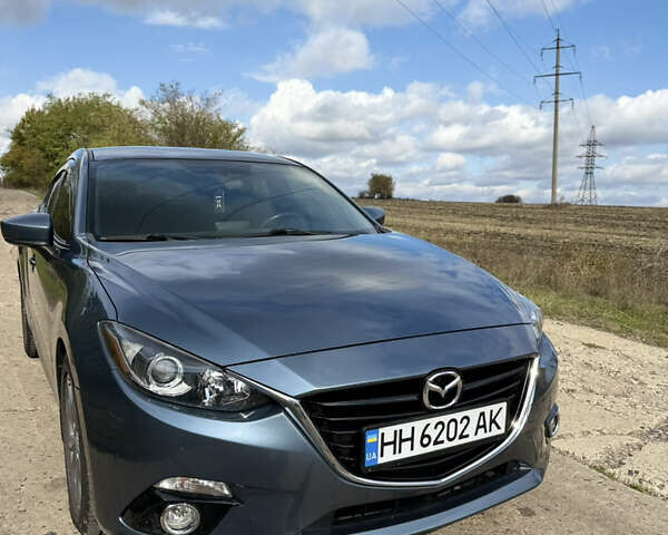 Синий Мазда 3, объемом двигателя 2 л и пробегом 126 тыс. км за 11200 $, фото 1 на Automoto.ua