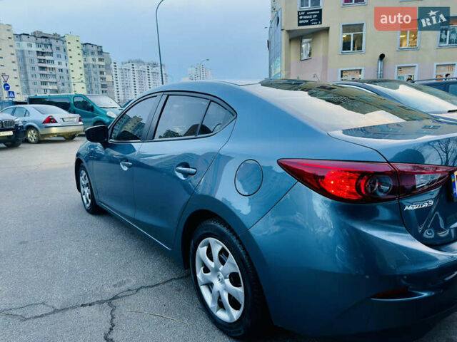 Синий Мазда 3, объемом двигателя 2 л и пробегом 198 тыс. км за 12000 $, фото 1 на Automoto.ua