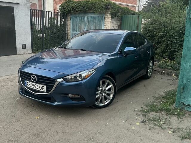 Синий Мазда 3, объемом двигателя 2 л и пробегом 157 тыс. км за 13315 $, фото 1 на Automoto.ua
