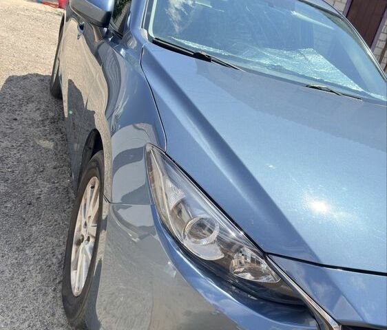 Синій Мазда 3, об'ємом двигуна 2 л та пробігом 220 тис. км за 9935 $, фото 1 на Automoto.ua