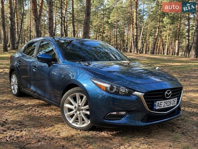 Синий Мазда 3, объемом двигателя 2 л и пробегом 157 тыс. км за 12300 $, фото 1 на Automoto.ua