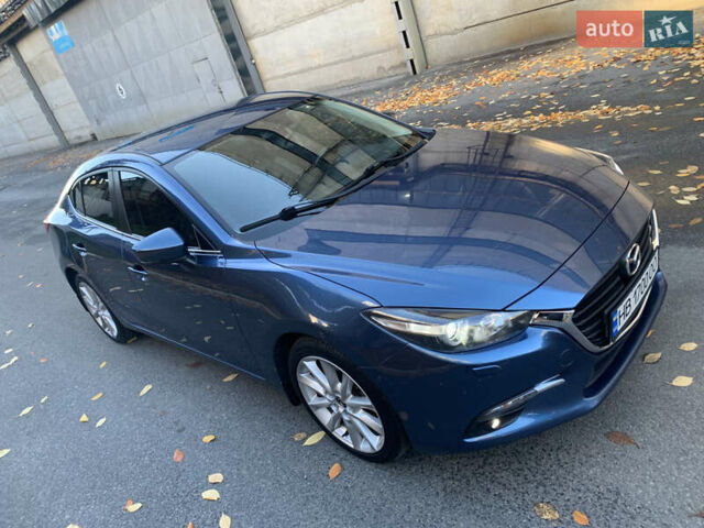 Синий Мазда 3, объемом двигателя 2 л и пробегом 58 тыс. км за 12900 $, фото 1 на Automoto.ua