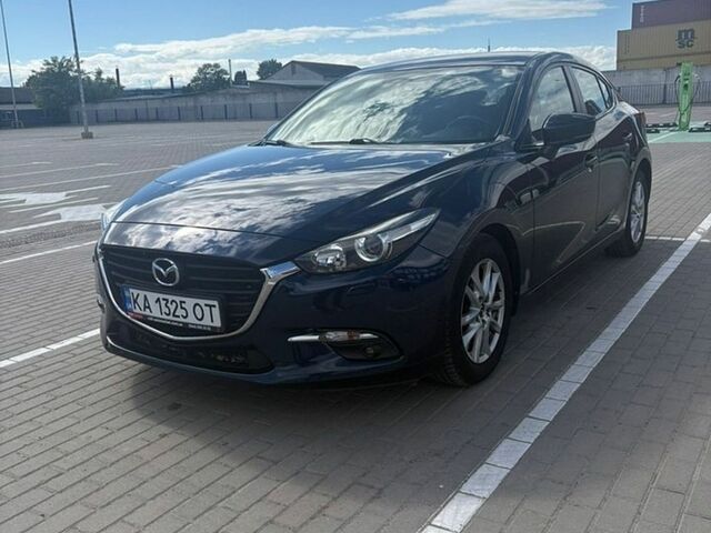 Синий Мазда 3, объемом двигателя 1.5 л и пробегом 106 тыс. км за 14000 $, фото 1 на Automoto.ua