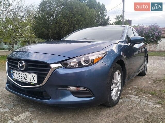 Синий Мазда 3, объемом двигателя 2 л и пробегом 87 тыс. км за 12000 $, фото 1 на Automoto.ua