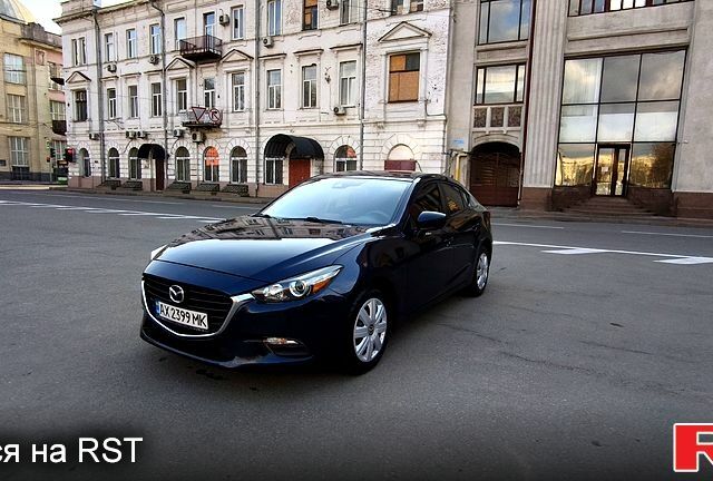 Синий Мазда 3, объемом двигателя 2 л и пробегом 162 тыс. км за 10900 $, фото 1 на Automoto.ua
