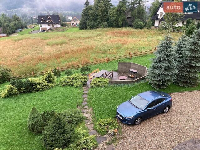 Синій Мазда 3, об'ємом двигуна 2 л та пробігом 89 тис. км за 13500 $, фото 1 на Automoto.ua