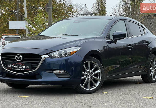 Синий Мазда 3, объемом двигателя 2.49 л и пробегом 65 тыс. км за 14599 $, фото 1 на Automoto.ua