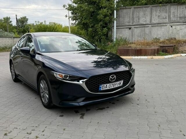 Синий Мазда 3, объемом двигателя 2.49 л и пробегом 122 тыс. км за 14200 $, фото 1 на Automoto.ua