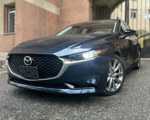 Синий Мазда 3, объемом двигателя 2.49 л и пробегом 50 тыс. км за 18000 $, фото 1 на Automoto.ua