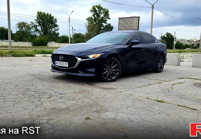 Синий Мазда 3, объемом двигателя 2.5 л и пробегом 93 тыс. км за 15900 $, фото 1 на Automoto.ua