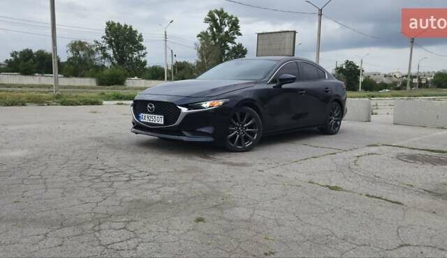 Синий Мазда 3, объемом двигателя 2.49 л и пробегом 93 тыс. км за 16500 $, фото 1 на Automoto.ua