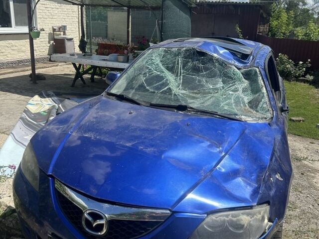Синий Мазда 3, объемом двигателя 1.6 л и пробегом 260 тыс. км за 2000 $, фото 1 на Automoto.ua