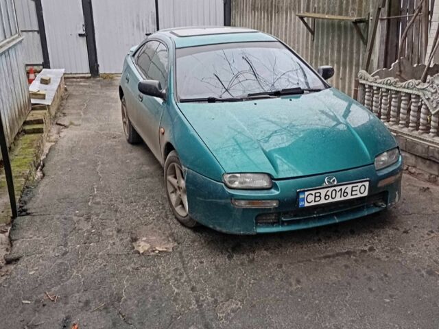 Зеленый Мазда 3, объемом двигателя 1.5 л и пробегом 250 тыс. км за 2000 $, фото 1 на Automoto.ua