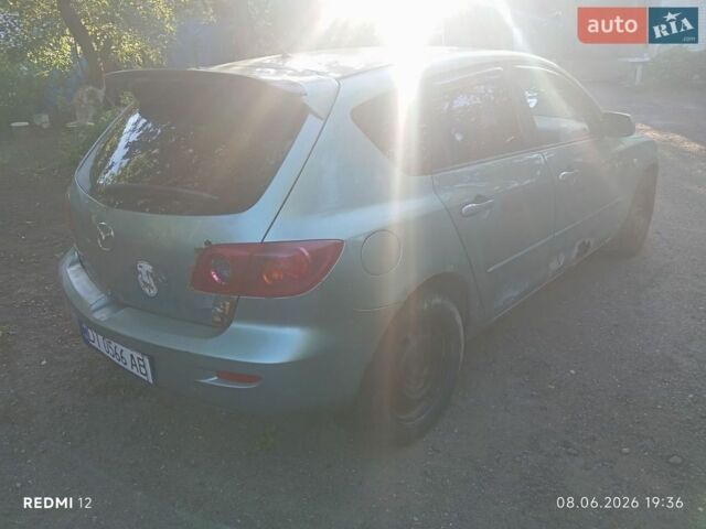 Зелений Мазда 3, об'ємом двигуна 2 л та пробігом 308 тис. км за 1850 $, фото 1 на Automoto.ua