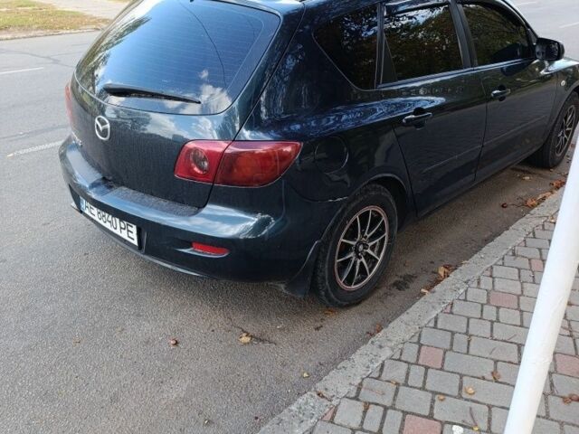 Зеленый Мазда 3, объемом двигателя 1.6 л и пробегом 250 тыс. км за 4100 $, фото 1 на Automoto.ua