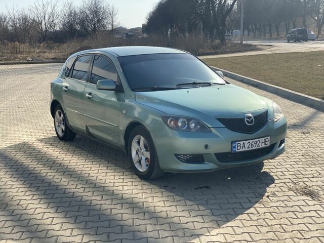 Зеленый Мазда 3, объемом двигателя 1.6 л и пробегом 365 тыс. км за 2675 $, фото 1 на Automoto.ua