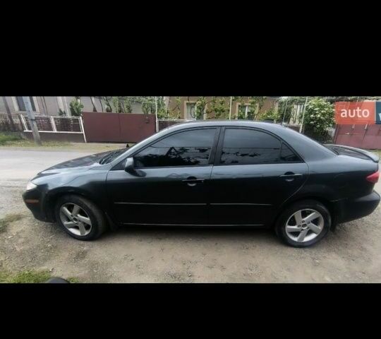 Зеленый Мазда 3, объемом двигателя 0 л и пробегом 257 тыс. км за 2000 $, фото 1 на Automoto.ua