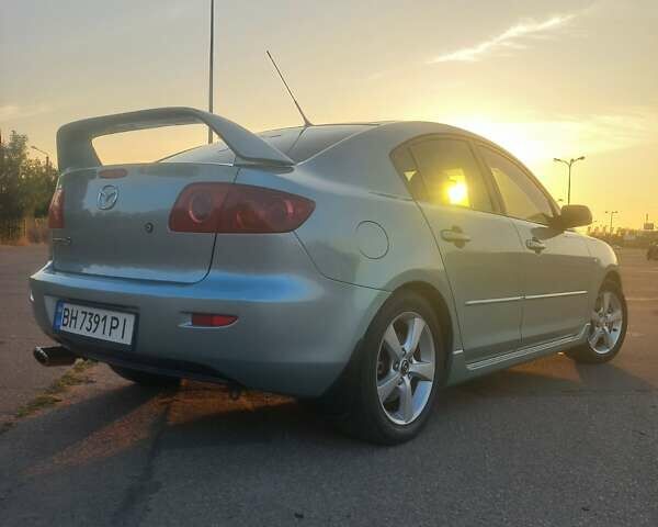 Зеленый Мазда 3, объемом двигателя 2 л и пробегом 177 тыс. км за 5600 $, фото 1 на Automoto.ua