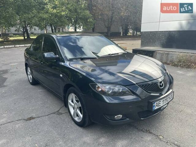 Зеленый Мазда 3, объемом двигателя 2 л и пробегом 176 тыс. км за 5700 $, фото 1 на Automoto.ua