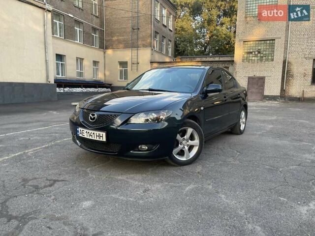 Зеленый Мазда 3, объемом двигателя 1.6 л и пробегом 155 тыс. км за 6099 $, фото 1 на Automoto.ua