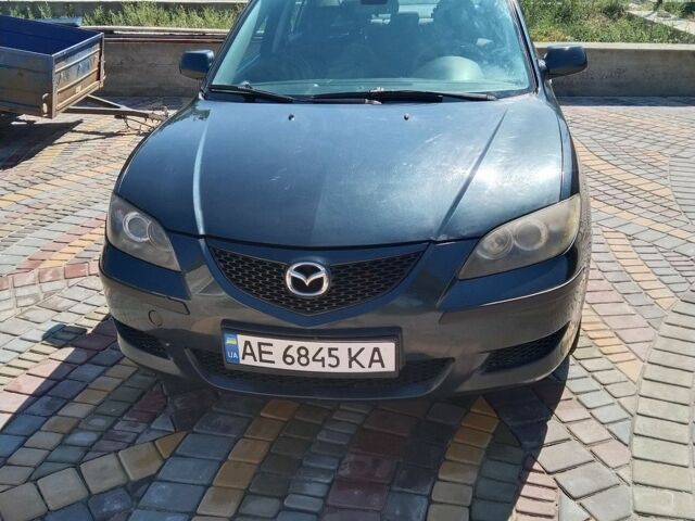 Зеленый Мазда 3, объемом двигателя 2 л и пробегом 249 тыс. км за 3800 $, фото 1 на Automoto.ua