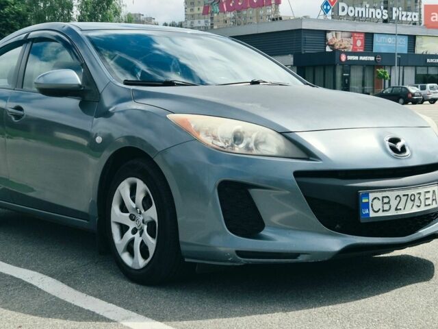 Зеленый Мазда 3, объемом двигателя 2 л и пробегом 275 тыс. км за 6600 $, фото 1 на Automoto.ua