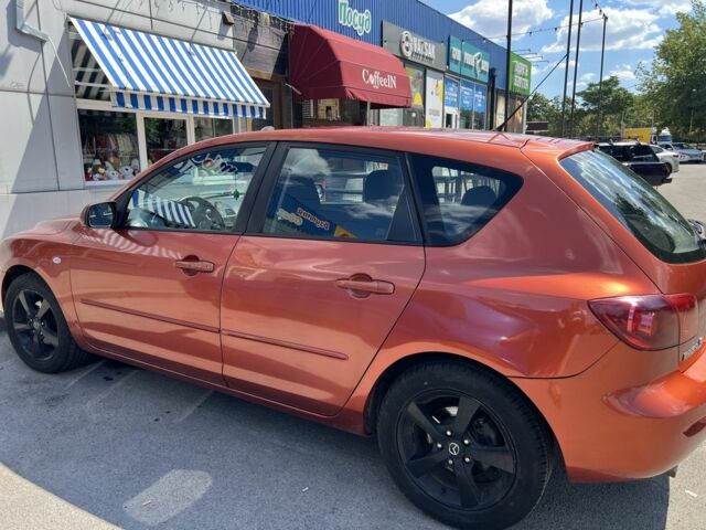 Оранжевый Мазда 3, объемом двигателя 1.6 л и пробегом 291 тыс. км за 4497 $, фото 1 на Automoto.ua