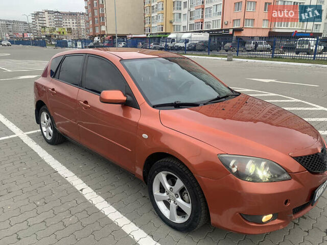 Оранжевый Мазда 3, объемом двигателя 1.6 л и пробегом 235 тыс. км за 3200 $, фото 1 на Automoto.ua