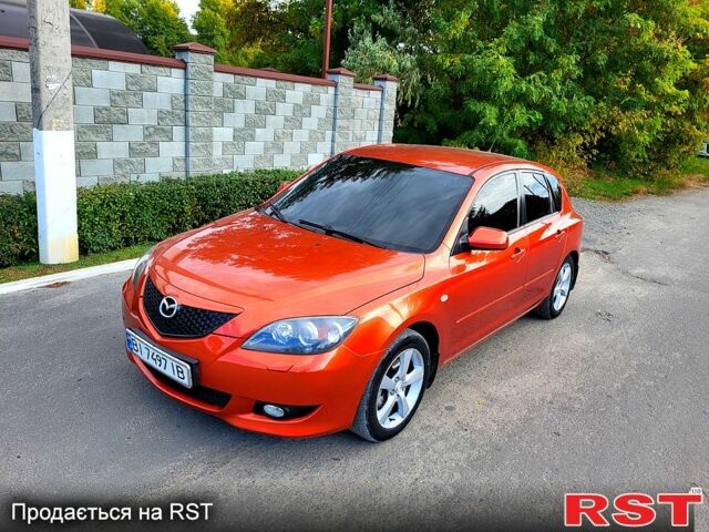 Оранжевый Мазда 3, объемом двигателя 1.6 л и пробегом 147 тыс. км за 5100 $, фото 1 на Automoto.ua