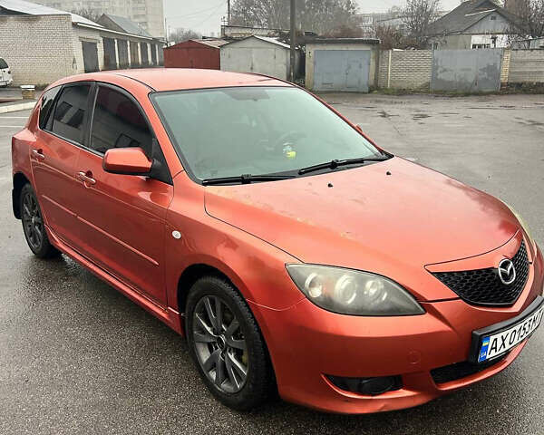Помаранчевий Мазда 3, об'ємом двигуна 1.6 л та пробігом 198 тис. км за 4400 $, фото 1 на Automoto.ua