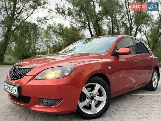Оранжевый Мазда 3, объемом двигателя 1.6 л и пробегом 329 тыс. км за 4499 $, фото 1 на Automoto.ua