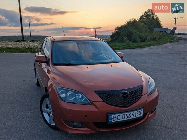 Оранжевый Мазда 3, объемом двигателя 1.6 л и пробегом 329 тыс. км за 3900 $, фото 1 на Automoto.ua
