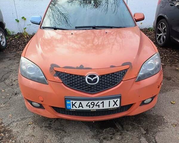 Оранжевый Мазда 3, объемом двигателя 1.6 л и пробегом 351 тыс. км за 3800 $, фото 1 на Automoto.ua
