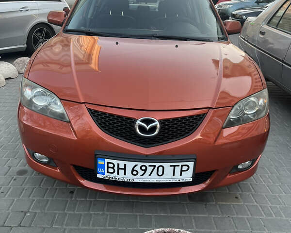 Оранжевый Мазда 3, объемом двигателя 1.6 л и пробегом 265 тыс. км за 4800 $, фото 1 на Automoto.ua