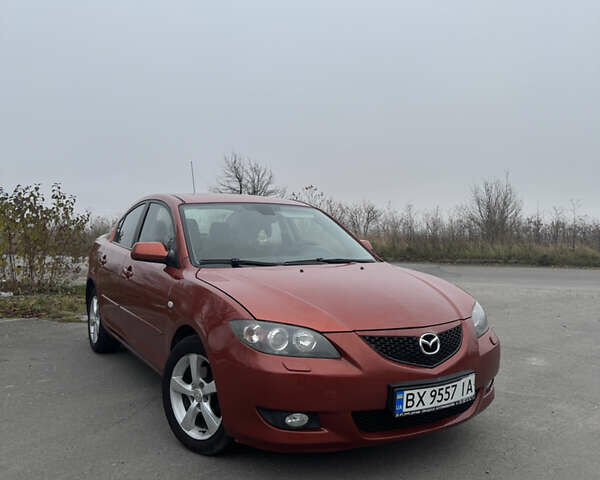 Оранжевый Мазда 3, объемом двигателя 1.6 л и пробегом 260 тыс. км за 4500 $, фото 1 на Automoto.ua