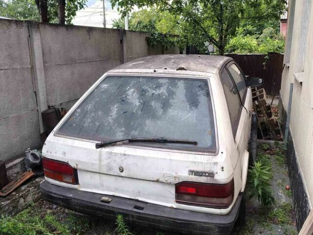 Білий Мазда 323, об'ємом двигуна 0 л та пробігом 380 тис. км за 157 $, фото 1 на Automoto.ua